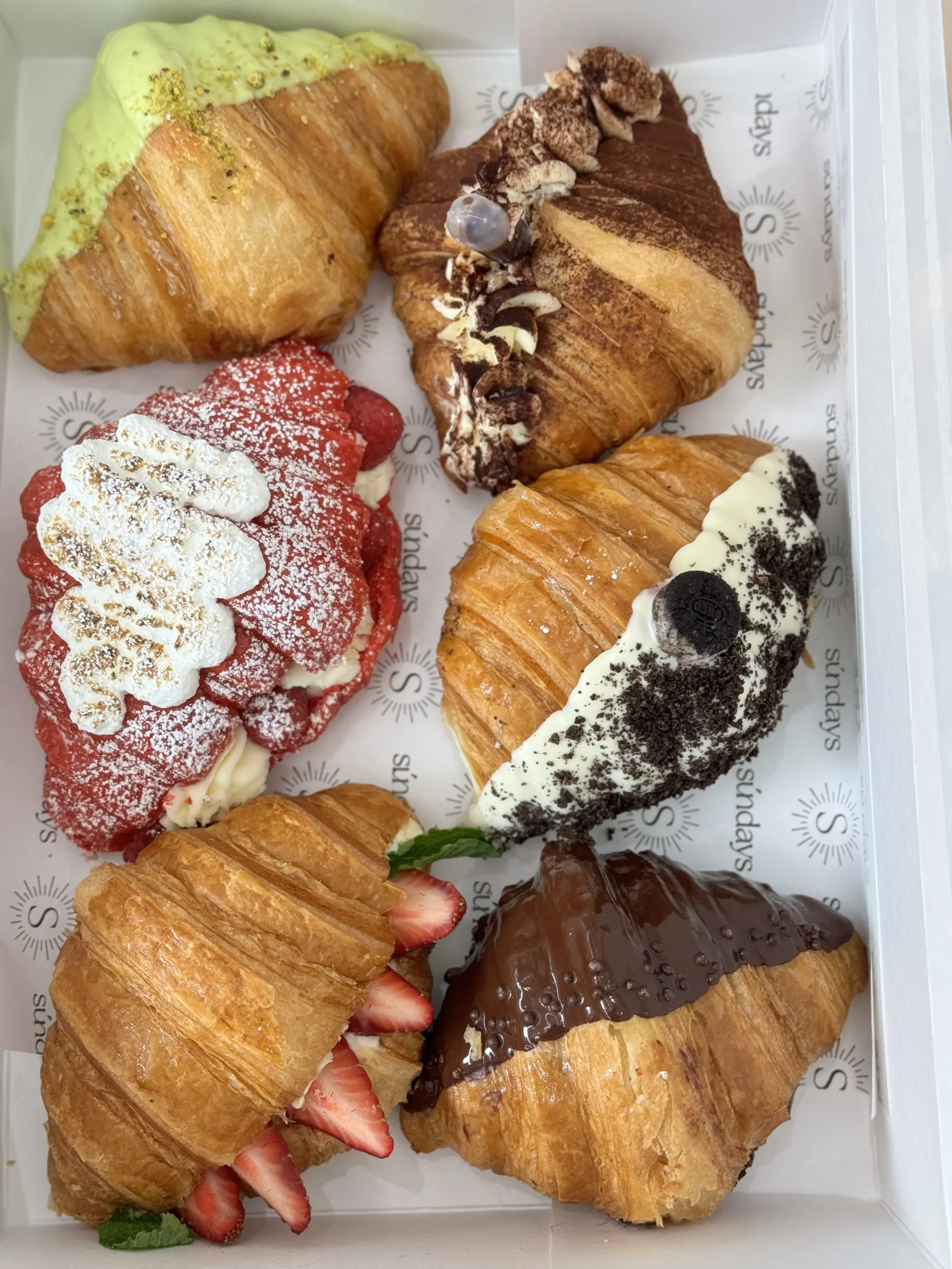 Assorted gourmet croissants in a variety box
