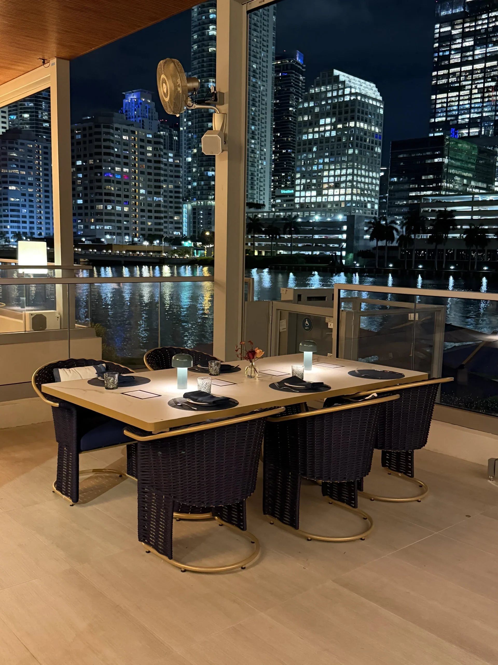 The Mexican restaurant interior with city skyline view through windows