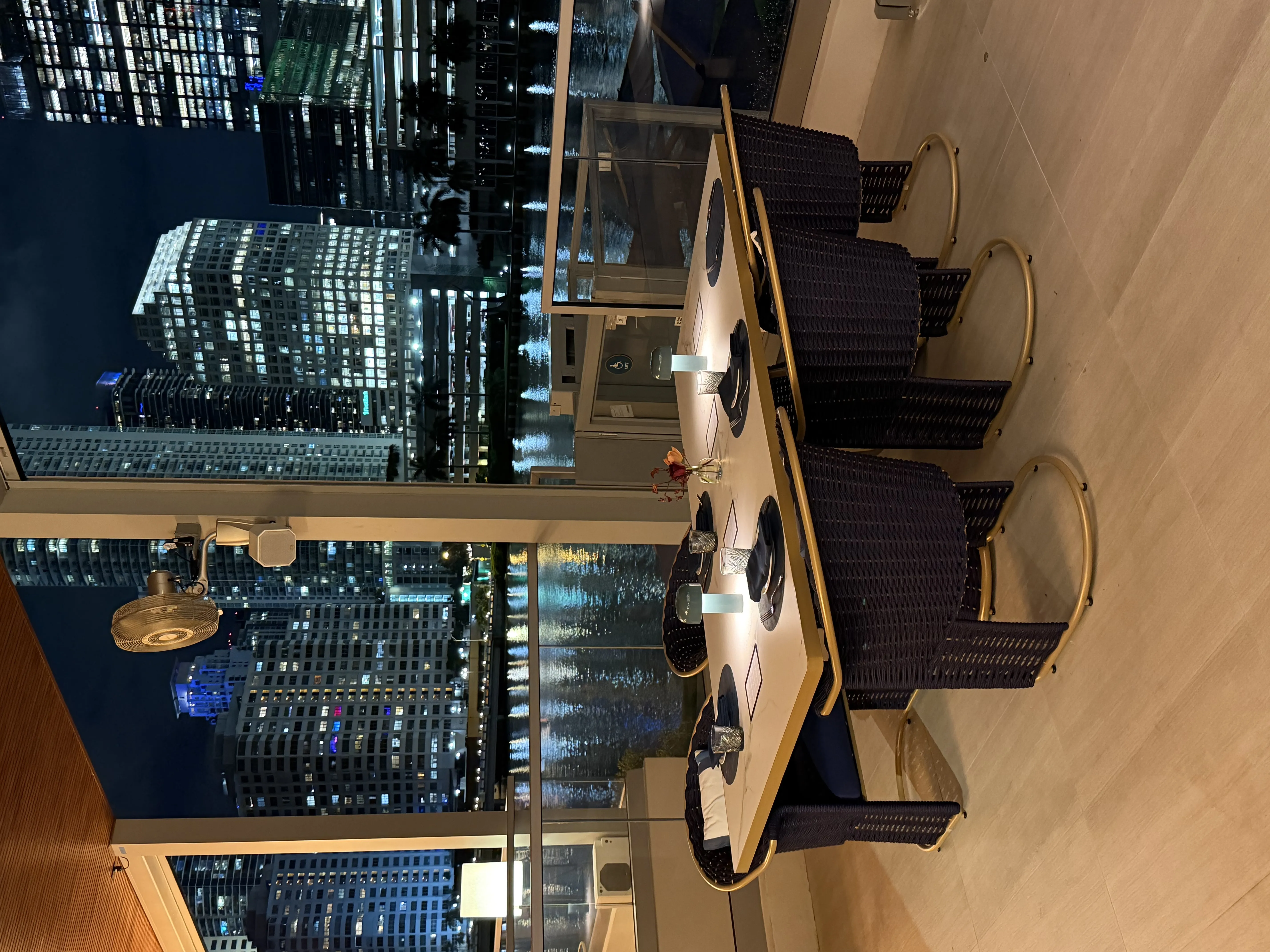 The Mexican restaurant interior with city skyline view through windows